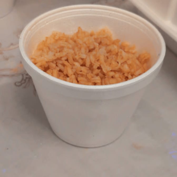 Porcion De Arroz (Portion of Rice).